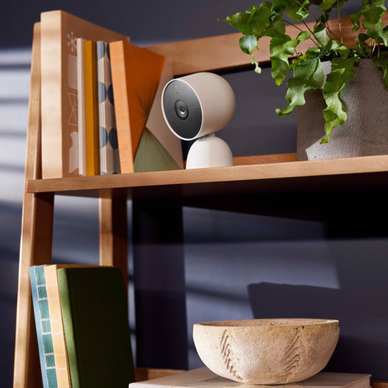 Google Nest Cam on a bookshelf inside a home